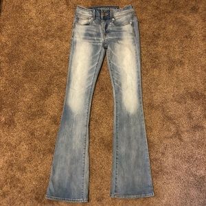 American Eagle light wash, mid rise, kick boot. 0.